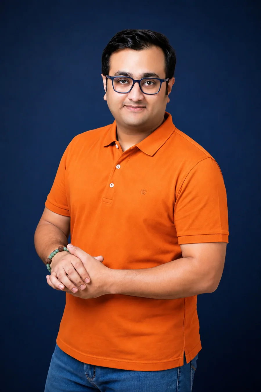 Rishikesh K. Mahajan, founder of Orbitt Media, in an orange polo